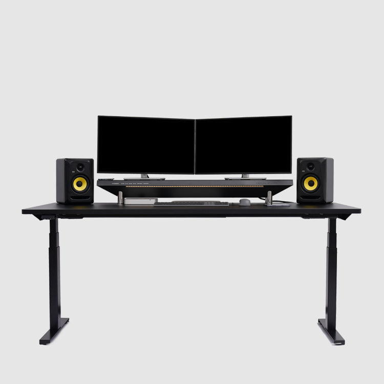 The desk is clean and organized with Hexcal Studio monitor stand. This pictures shows a dual monitor setup with multiple devices.